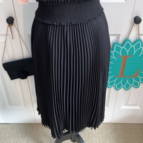 Fabulous LBD blouson dress featuring a smocked waist & accordion pleats - Picture 10 of 15